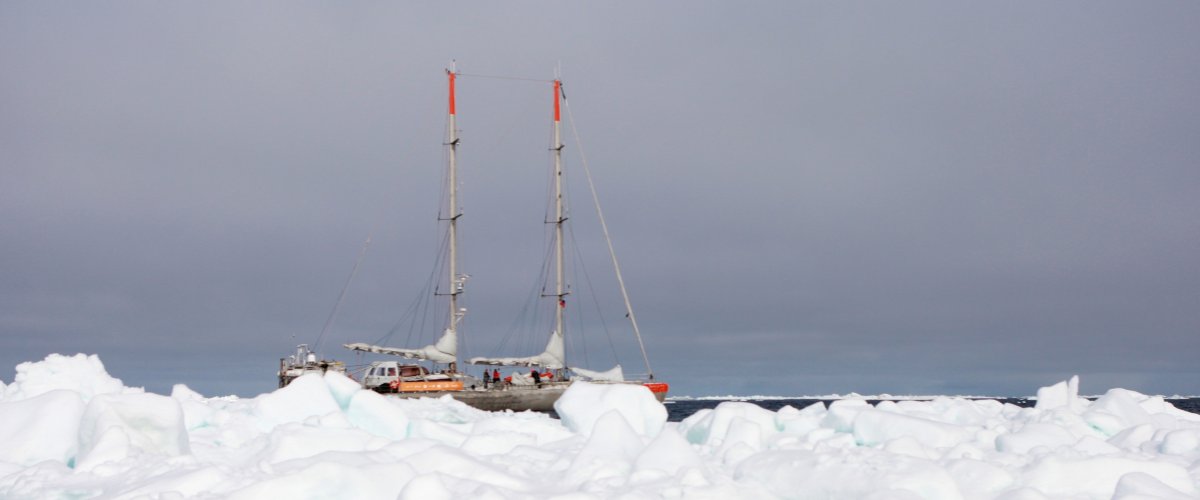 Tara behind ice  ©François Aurat  Fondation Tara Ocean.jpg